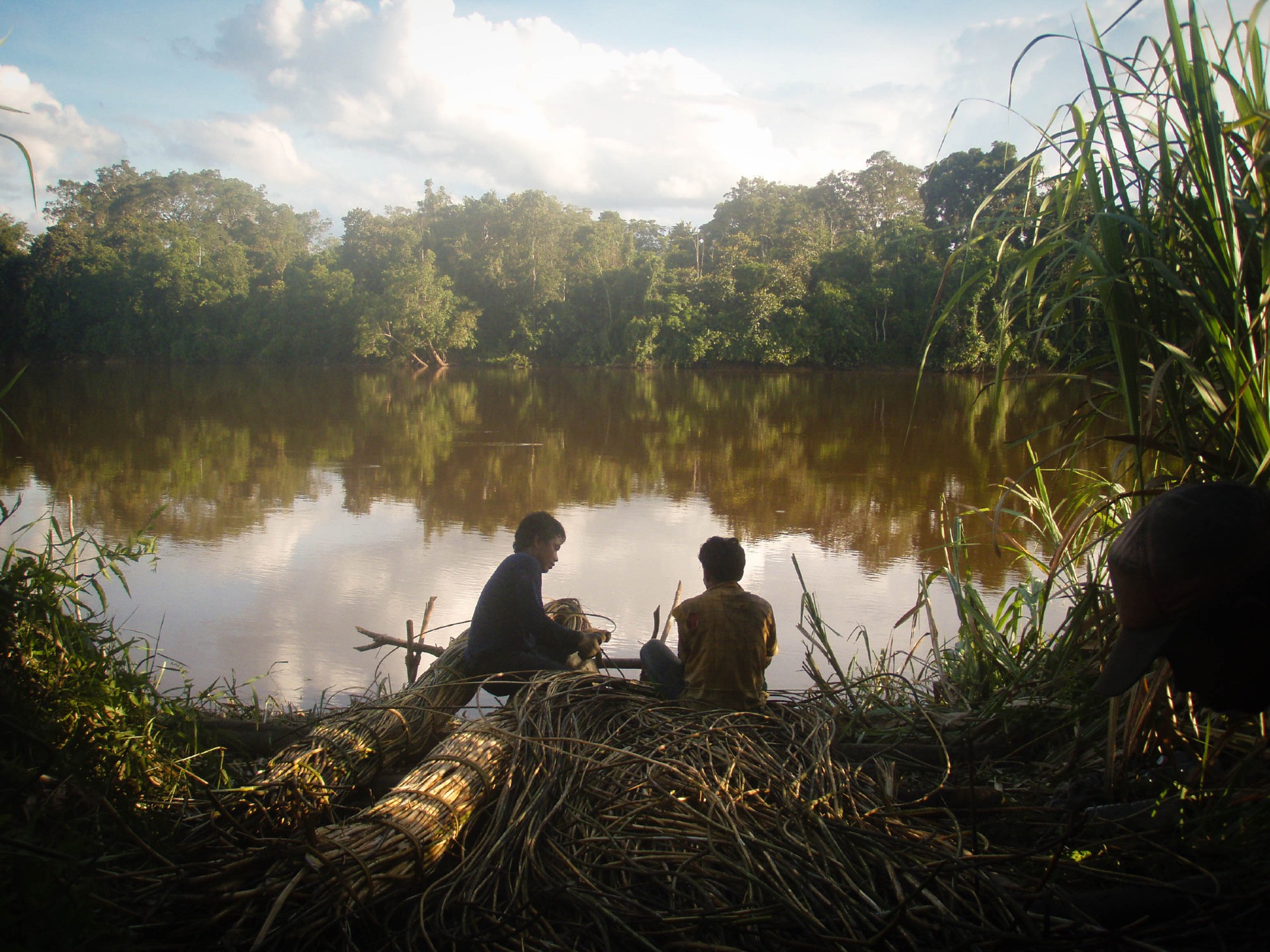 Community members tend to their nets in Katingan Peatlands and Forest in Indonesia.